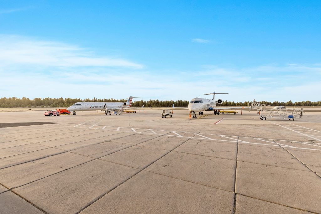 Two passenger airplanes on the ramp at Flagstaff airport